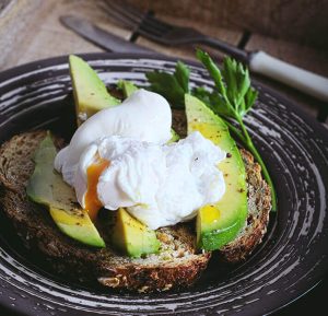 perfect poached egg on avocado on toast