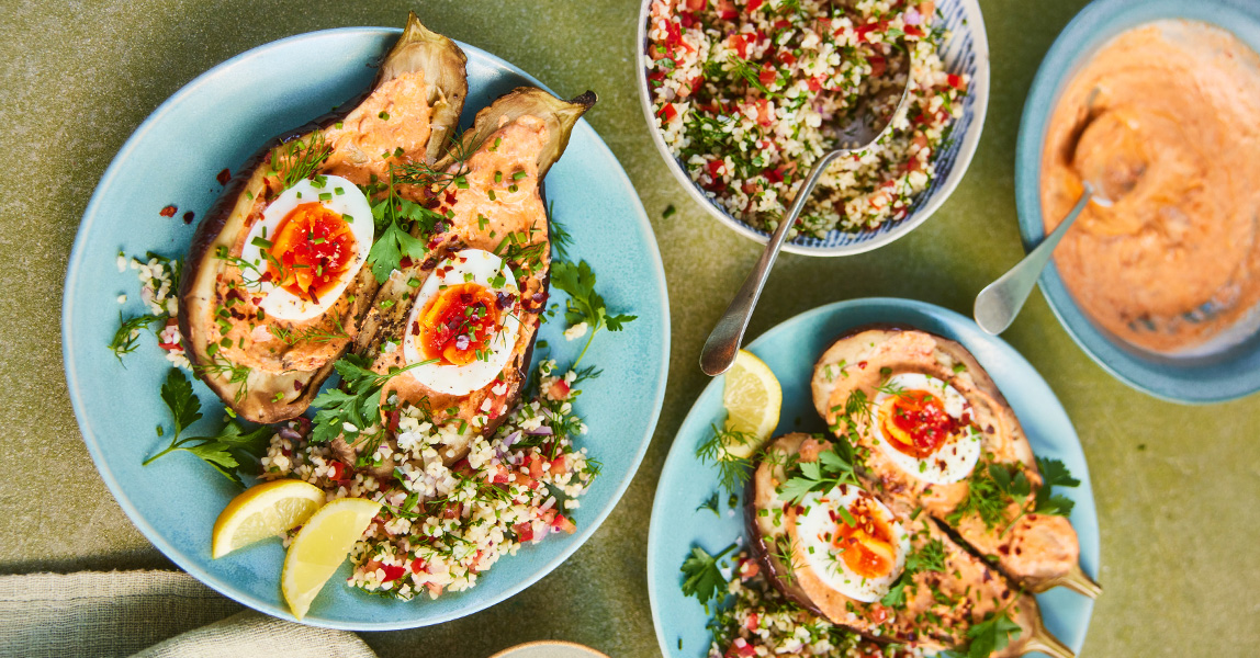 Baked aubergine with softly boiled eggs, chilli tahini yoghurt and ...